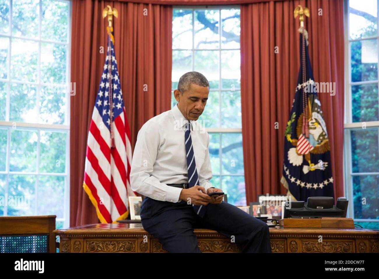 BARACK OBAMA as US President in the White House Oval office in 2012. Photo: Pete Souza-White House Stock Photo
