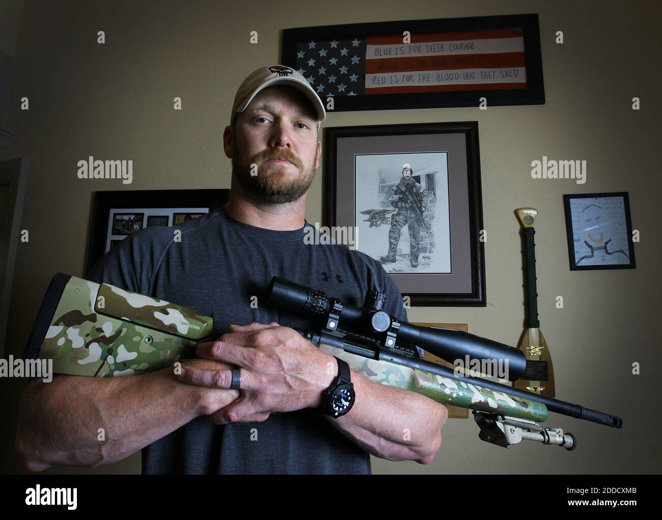 NO FILM, NO VIDEO, NO TV, NO DOCUMENTARY - Chris Kyle, a retired Navy SEAL and bestselling author of the book 'American Sniper: The Autobiography of the Most Lethal Sniper in U.S. Military History', holds a .308 sniper rifle in this April 6, 2012, file photo. Kyle was one of two people reported killed on the gun range at Rough Creek Lodge near Glen Rose, Texas, Saturday, February 2 2013. Photo by Paul Moseley/Fort Worth Star-Telegram/MCT/ABACAPRESS.COM Stock Photo