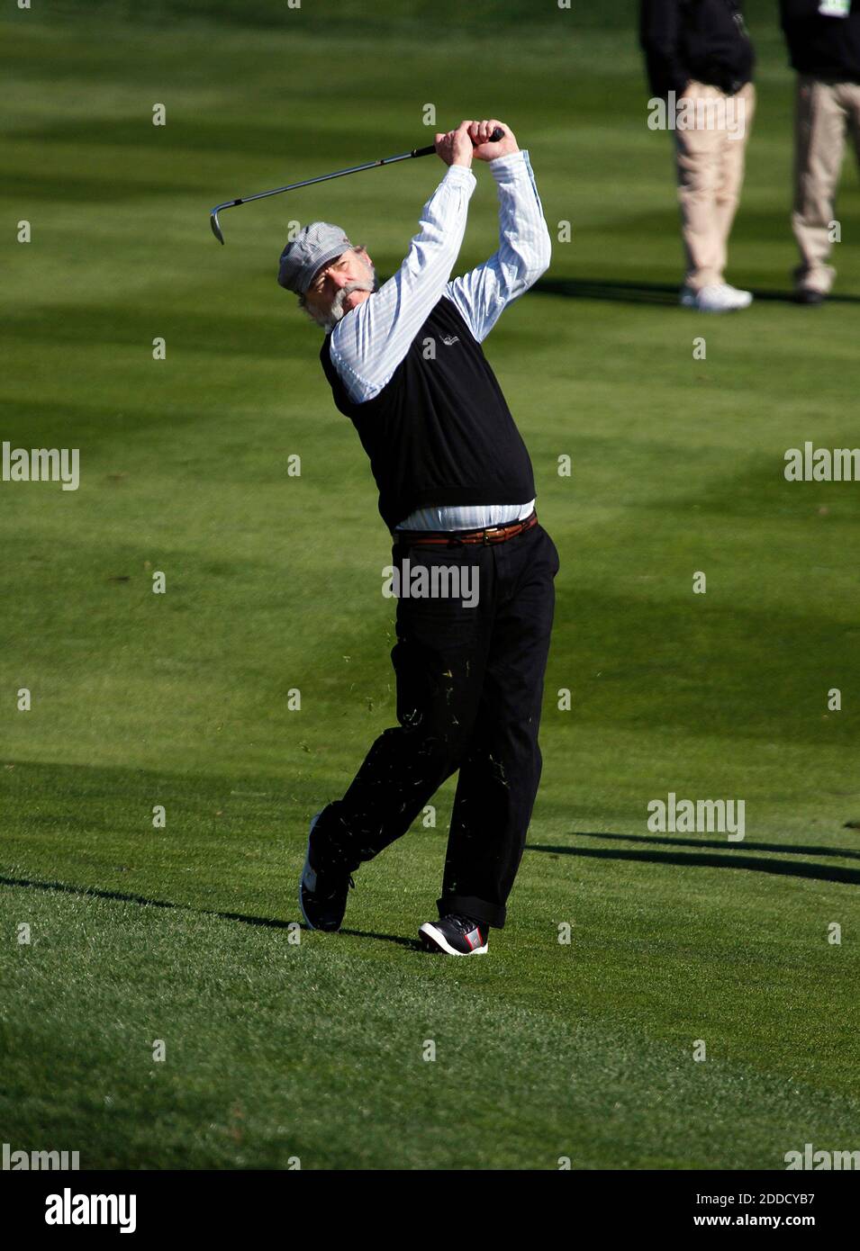 NO FILM, NO VIDEO, NO TV, NO DOCUMENTARY - Actor Bill Murray hits from the fairway at the third hole during the $100,000 celebrity charity shoot-out golf match at the AT&T Pebble Beach National Pro-Am in Pebble Beach, CA, USA on February 6, 2013. Photo by LiPo Ching/San Jose Mercury News/MCT/ABACAPRESS.COM Stock Photo