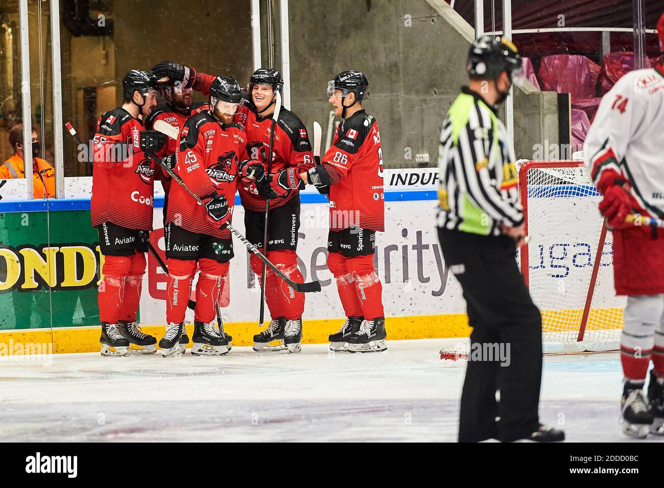 Aalborg, Denmark. 24th Nov, 2020. Julian Jakobsen (61), Mikkel Hojbjerg (45) and Josh MacDonald (86) of Aalborg Pirates seen in the Metalligaen ice hockey match between Aalborg Pirates and Odense Bulldogs at Bentax Isarena in Aalborg. (Photo Credit: Gonzales Photo/Alamy Live News Stock Photo