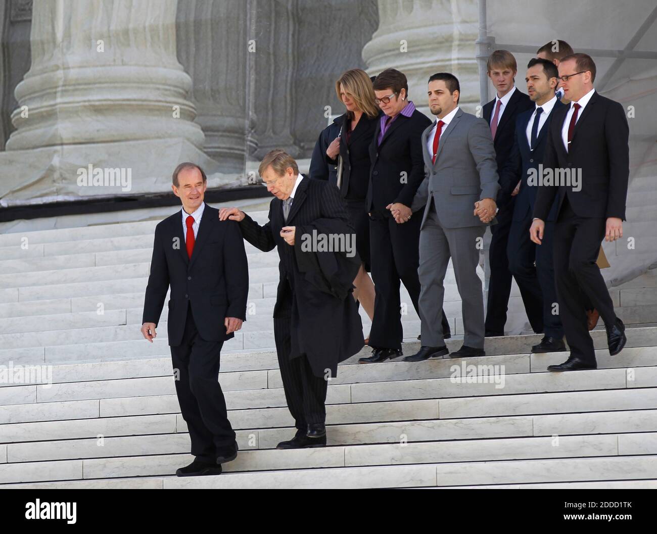 NO FILM, NO VIDEO, NO TV, NO DOCUMENTARY - Attorneys David Bois (front, left) and Ted Olson walk out of the U.S. Supreme Court followed by plaintiffs (from left) Sandy Stier, Kris Perry, Jeff Zarillo, Elliot Perry (son of Kris and Sandy), Paul Katami, and human rights advocate Chad Griffin, after California's Proposition 8 was argued before the Court in Washington, D.C., Tuesday, March 26, 2013. Photo by Molly Riley/MCT/ABACAPRESS.COM Stock Photo