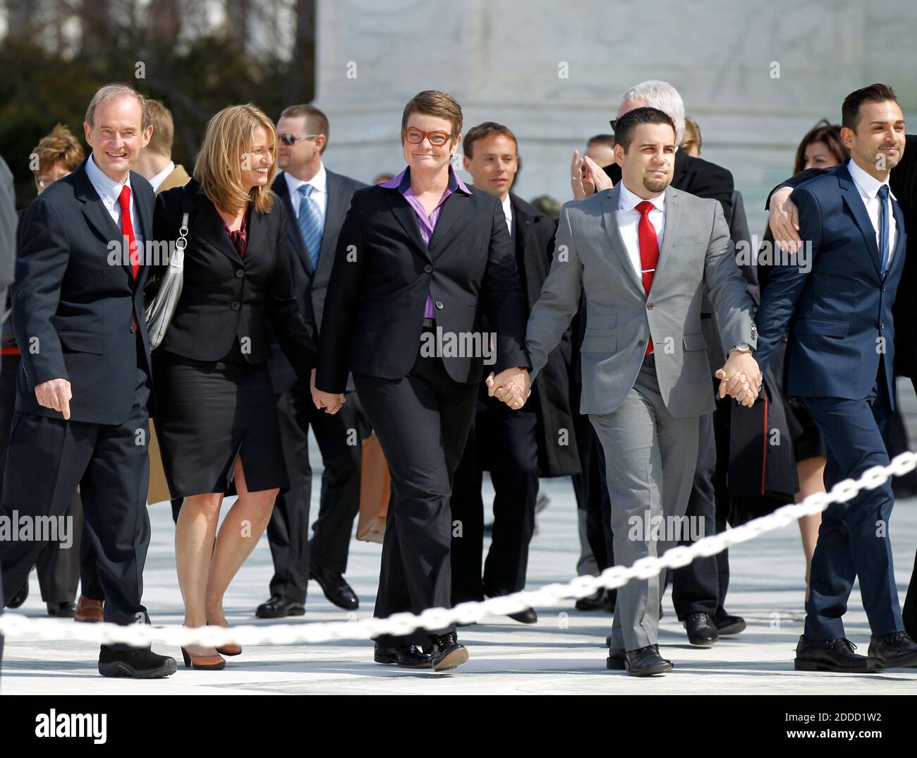 NO FILM, NO VIDEO, NO TV, NO DOCUMENTARY - Attorneys David Bois (left) walks out of the U.S. Supreme Court with plaintiffs, from left, Sandy Stier, Kris Perry, Jeff Zarillo, and Paul Katami, after California's Proposition 8 was argued before the Court in Washington, D.C., Teusday, March 26, 2013. Photo by Molly Riley/MCT/ABACAPRESS.COM Stock Photo