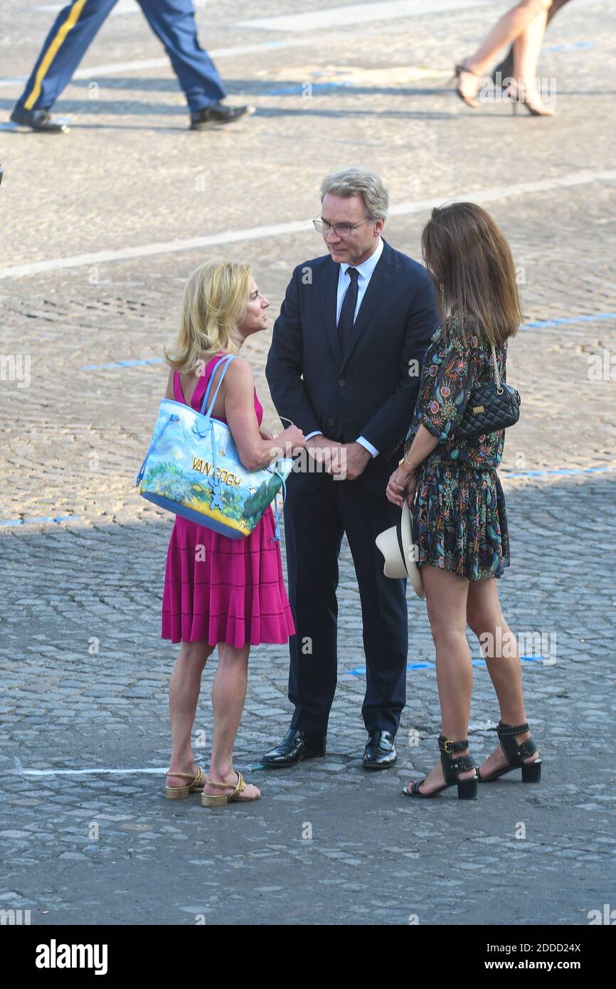 French journalist Olivier Royant and wife meet US Ambassador to France