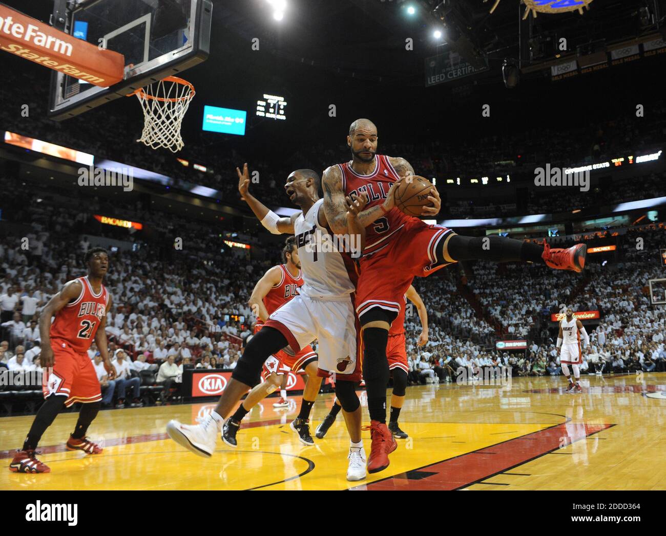 NO FILM, NO VIDEO, NO TV, NO DOCUMENTARY - Chris Bosh of the Miami Heat and Carlos Boozer of the Chicago Bulls battle for a rebound during the first quarter of the NBA Eastern Conference playoffs at the AmericanAirlines Arena in Miami, Florida, USA on Wednesday, May 6, 2013. Photo by Joe Cavaretta/Sun Sentinel/MCT/ABACAPRESS.COM Stock Photo