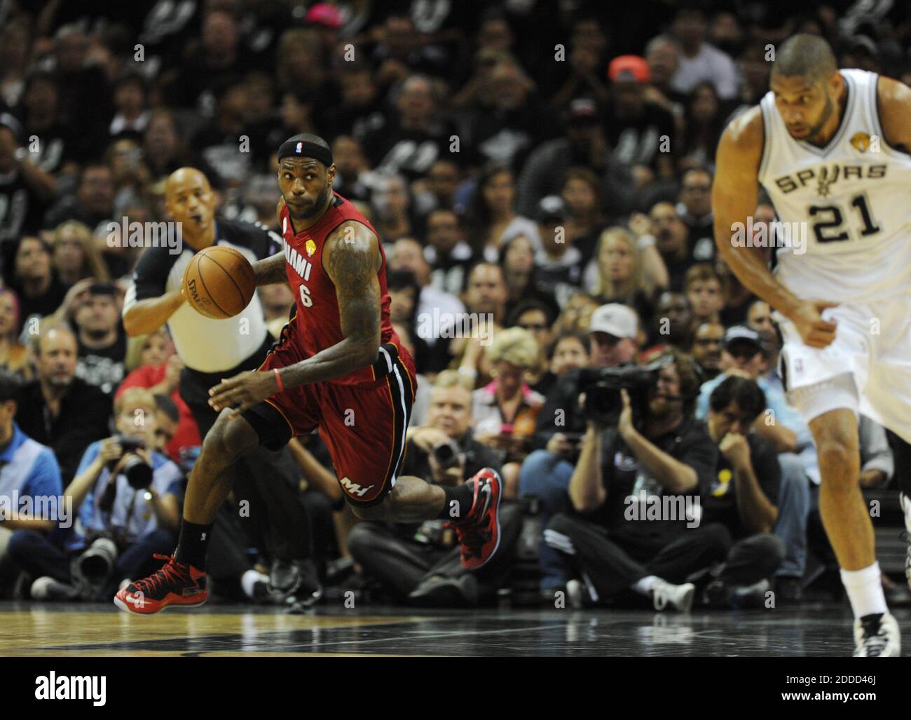San Antonio Spurs' Boris Diaw and Miami Heat center Chris Bosh battle under  the basket in Game 5 of the NBA Finals at the AT&T Center in San Antonio,  Texas, on Sunday