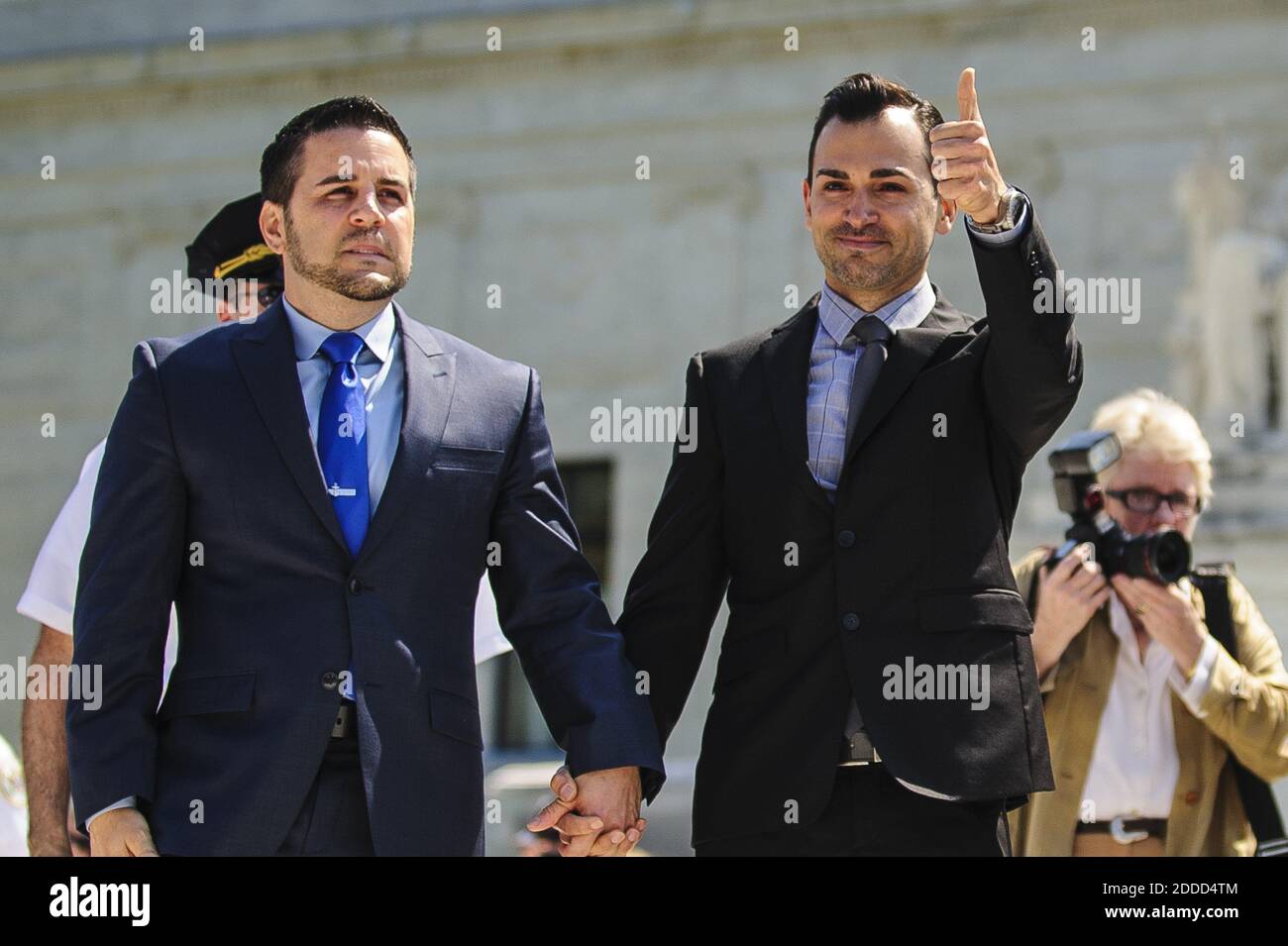 NO FILM, NO VIDEO, NO TV, NO DOCUMENTARY - Plaintiffs in the challenge to California's Proposition 8,Jeff Zarrillo and his partner Paul Katami, walk down the steps outside the U.S. Supreme Court on Wednesday, June 26, 2013. While the court struck down the Defense of Marriage Act, it chose not to rule on an appeal on Proposition 8 effectively undercutting the law. Photo by Pete Marovich/MCT/ABACAPRESS.COM Stock Photo