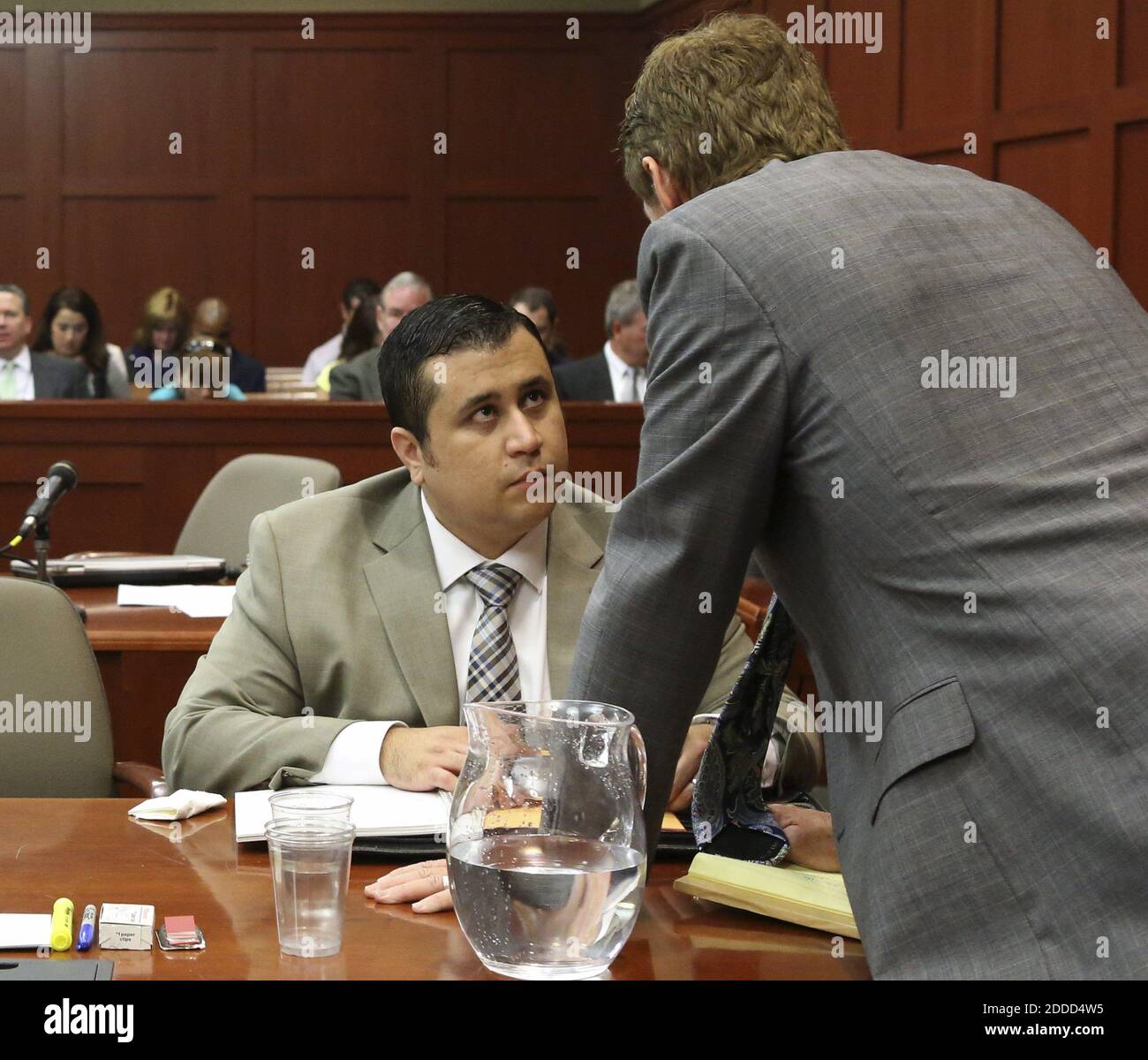 NO FILM, NO VIDEO, NO TV, NO DOCUMENTARY - George Zimmerman, left, chats with his attorney Mark O'Mara on the 12th day of his trial in Sanford, Florida, USA, on Tuesday, June 25, 2013. Zimmerman is charged in the fatal shooting of Trayvon Martin. Photo by Gary W. Green/Orlando Sentinel/MCT/ABACAPRESS.COM Stock Photo