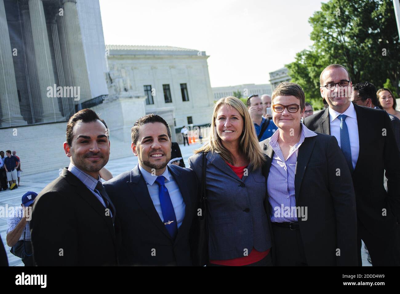 NO FILM, NO VIDEO, NO TV, NO DOCUMENTARY - Plaintiffs in the challenge to California's Proposition 8, from left, Paul Katami and his partner Jeff Zarillo and Sandy Stier and her partner Kris Perry, stand outside the U.S. Supreme Court on Wednesday, June 26, 2013. While the court struck down the Defense of Marriage Act, it chose not to rule on an appeal on Proposition 8 effectively undercutting the law. Photo by Pete Marovich/MCT/ABACAPRESS.COM Stock Photo