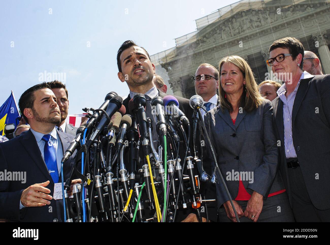 NO FILM, NO VIDEO, NO TV, NO DOCUMENTARY - Plaintiffs in the challenge to California's Proposition 8, Paul Katami, center, and Jeff Zarillo, left, speak outside the U.S. Supreme Court on Wednesday, June 26, 2013. While the court struck down the Defense of Marriage Act, it chose not to rule on an appeal on Proposition 8 effectively undercutting the law. Photo by Pete Marovich/MCT/ABACAPRESS.COM Stock Photo