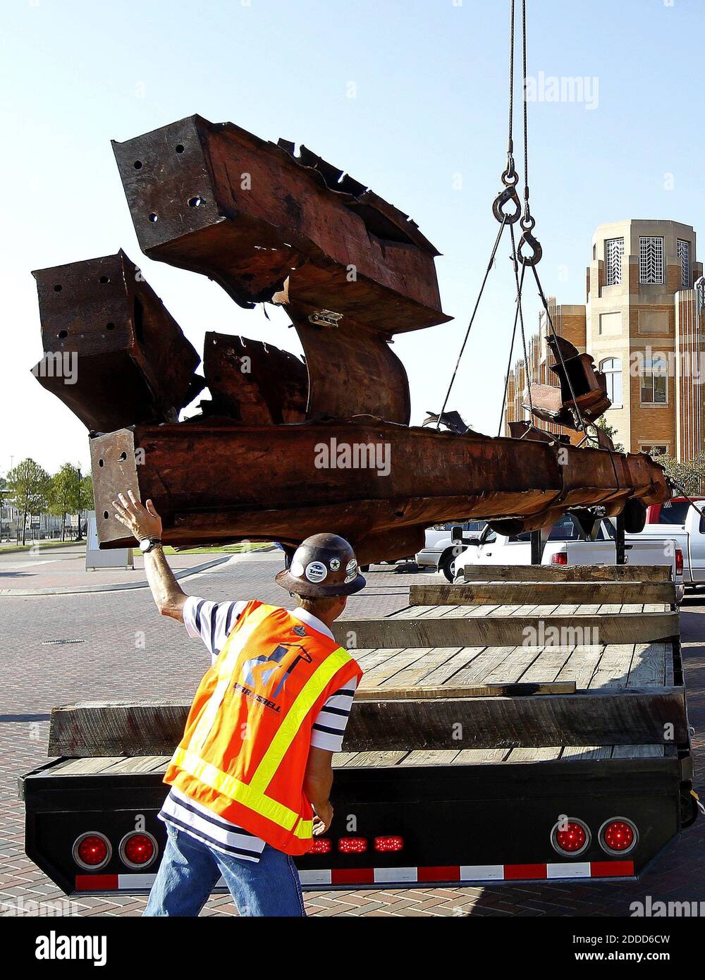 NO FILM, NO VIDEO, NO TV, NO DOCUMENTARY - Twisted steel from the World Trade Center is moved from a flat bed truck by contractors from Austin Commercial Tuesday September 3, 2013 in Fort Worth, TX, USA. The steel beam that was located just above the 100th story of the north tower of the Worth Trade Center will be on permanent display at the Fort Worth Museum of Science and History. Photo by Ron Jenkins/Fort Worth Star-Telegram/MCT/ABACAPRESS.COM Stock Photo