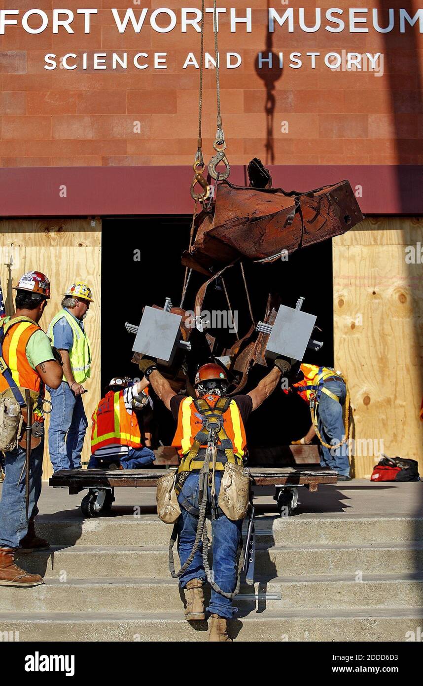 NO FILM, NO VIDEO, NO TV, NO DOCUMENTARY - Twisted steel from the World Trade Center is moved inside the Fort Worth Museum of Science and History by contractors from Austin Commercial, Tuesday, September 3, 2013, in Fort Worth, TX, USA. The steel beam that was located just above the 100th story of the north tower of the Worth Trade Center will be on permanent display at the Fort Worth museum. Photo by Ron Jenkins/Fort Worth Star-Telegram/MCT/ABACAPRESS.COM Stock Photo