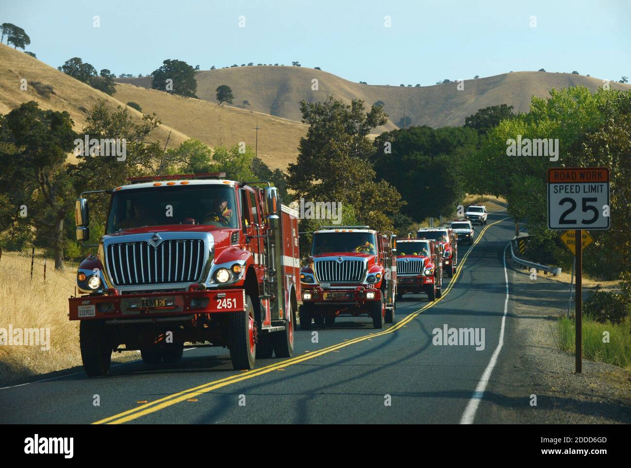 NO FILM, NO VIDEO, NO TV, NO DOCUMENTARY - Cal Fire trucks travel towards Clayton along Marsh Creek Road in an unincorporated area of Contra Costa County, California, USA, as they move into their next position to fight the Morgan Fire near Clayton on Monday, September 9, 2013. Photo by Susan Tripp Pollard/Bay Area News Group/MCT/ABACAPRESS.COM Stock Photo