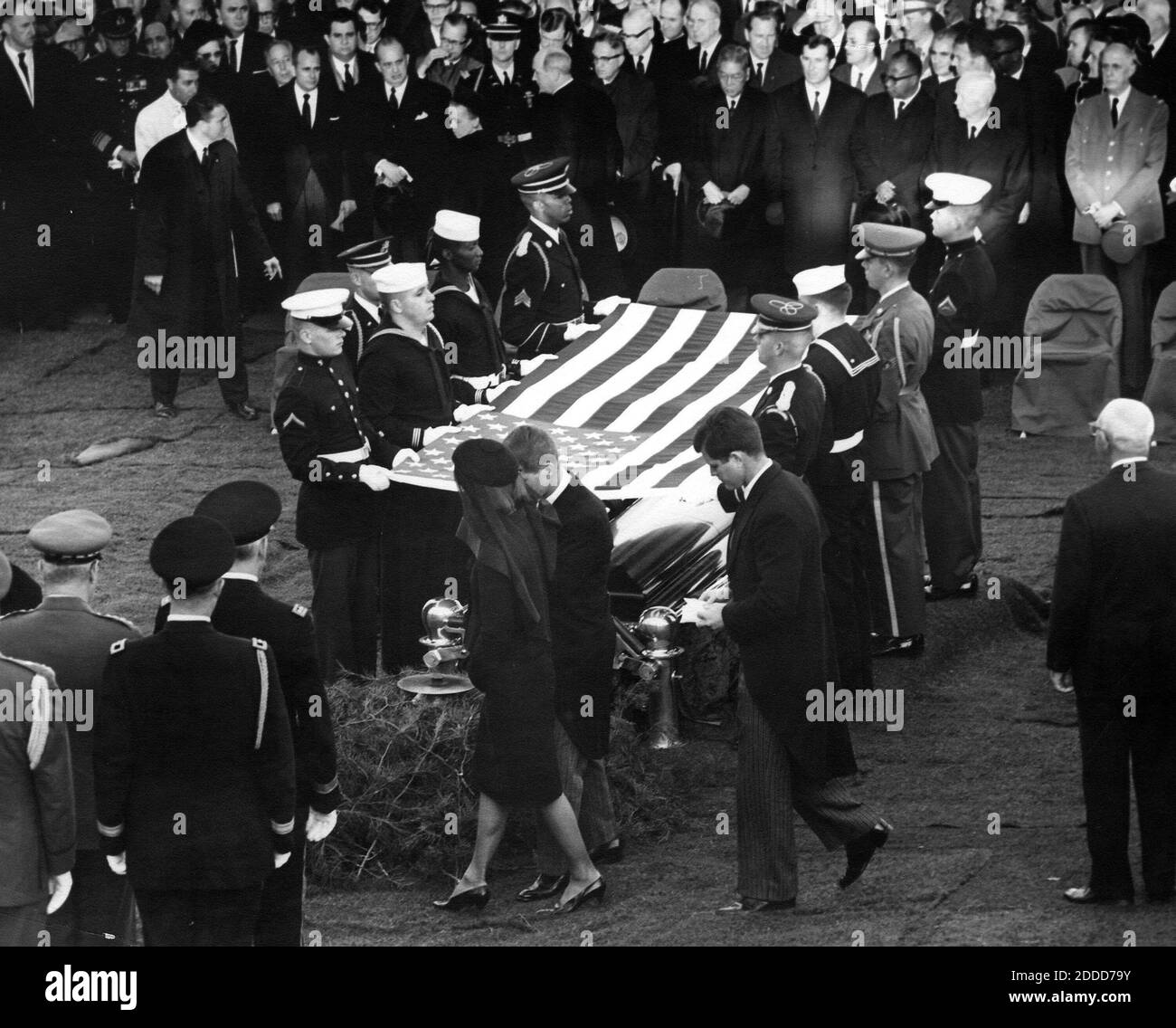 NO FILM, NO VIDEO, NO TV, NO DOCUMENTARY - Attorney General Robert F. Kennedy escorts Jacqueline Kennedy past the Honor Guard at the grave of President Kennedy, during the burial ceremony for the president at Arlington National Cemetery in Arlington, Va., on Nov. 25. Sen. Edward M. Kennedy follows behind. Photo by Abbie Rowe/National Parks Service/John F. Kennedy Presidential Library and Museum/MCT/ABACAPRESS.COM Stock Photo