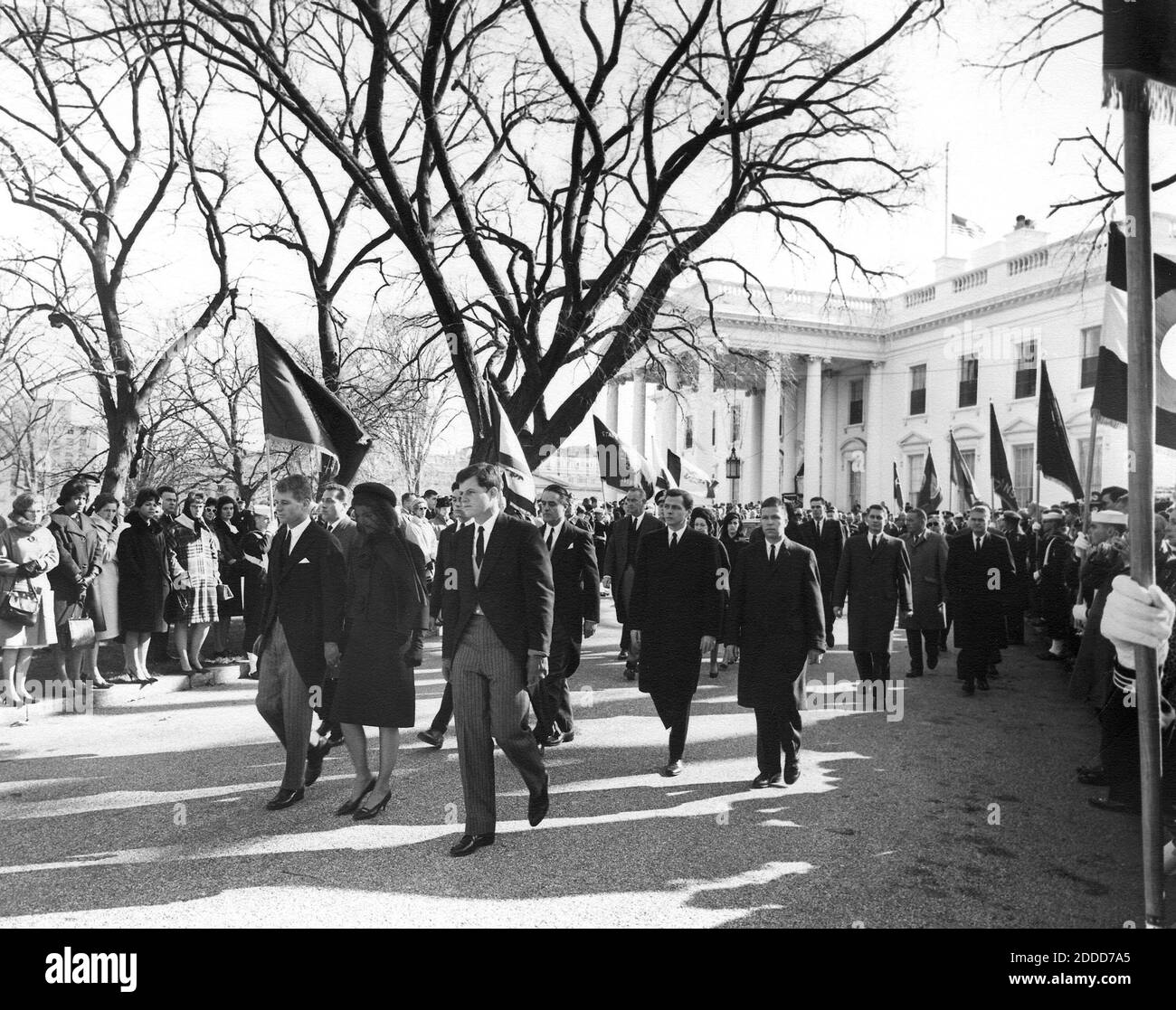 NO FILM, NO VIDEO, NO TV, NO DOCUMENTARY - The procession to St. Matthews Cathedral for the funeral of President John F. Kennedy leaves the White House in Washington, D.C., on Nov. 25, 1963. First Row, L-R: Attorney General Robert F. Kennedy, Jacqueline Kennedy, Senator Edward M. Kennedy; Second Row: James Auchincloss, R. Sargent Shriver and Steven Smith; Third Row: Mrs. Lady Bird Johnson, President Johnson and Luci Baines Johnson. Photo by Abbie Rowe/National Park Service/John F. Kennedy Presidential Library and Museum/MCT/ABACAPRESS.COM Stock Photo