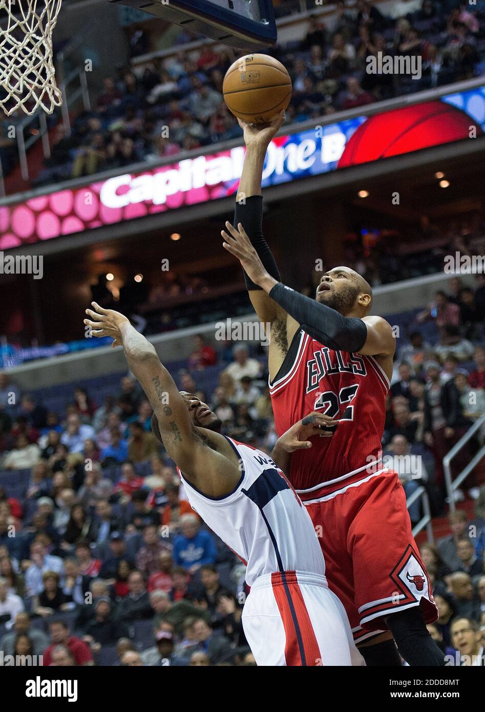 Washington Wizards Trevor Booker, center, reacts after hitting a 3-pointer  against the New Jersey Nets in the first quarter of an NBA basketball game,  Wednesday, March 21, 2012, in Newark, N.J. (AP