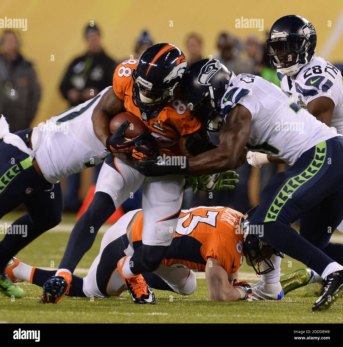 NO FILM, NO VIDEO, NO TV, NO DOCUMENTARY - Denver Broncos running back  Montee Ball (28) is stopped by the Seattle Seahawks in the second quarter  of Super Bowl XLVIII at MetLife