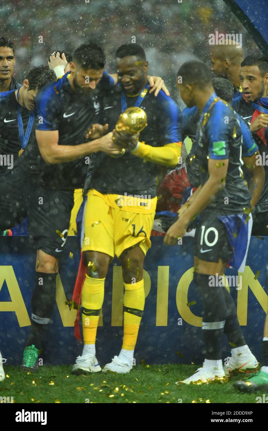 France's teammates Olivier Giroud and Steve Mandanda hold the trophy after winning 4-2 the 2018 FIFA World cup final football match France v Croatia at Luzhniki stadium in Moscow, Russia on July 15, 2018. Photo by Lionel Hahn/ABACAPRESS.COM Stock Photo