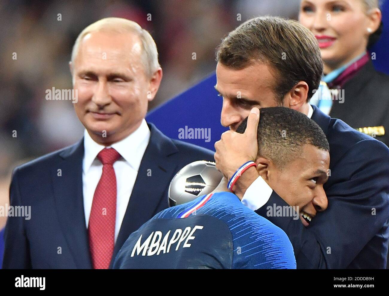 President Emmanuel Macron presents France's forward Kylian Mbappe with the 2018 FIFA Best Young Player award at a victory ceremony after the 2018 FIFA World Cup final football match between France and Croatia at Luzhniki Stadium. on july 15, 2018. Photo by Christian Liewig/ABACAPRESS.COM Stock Photo