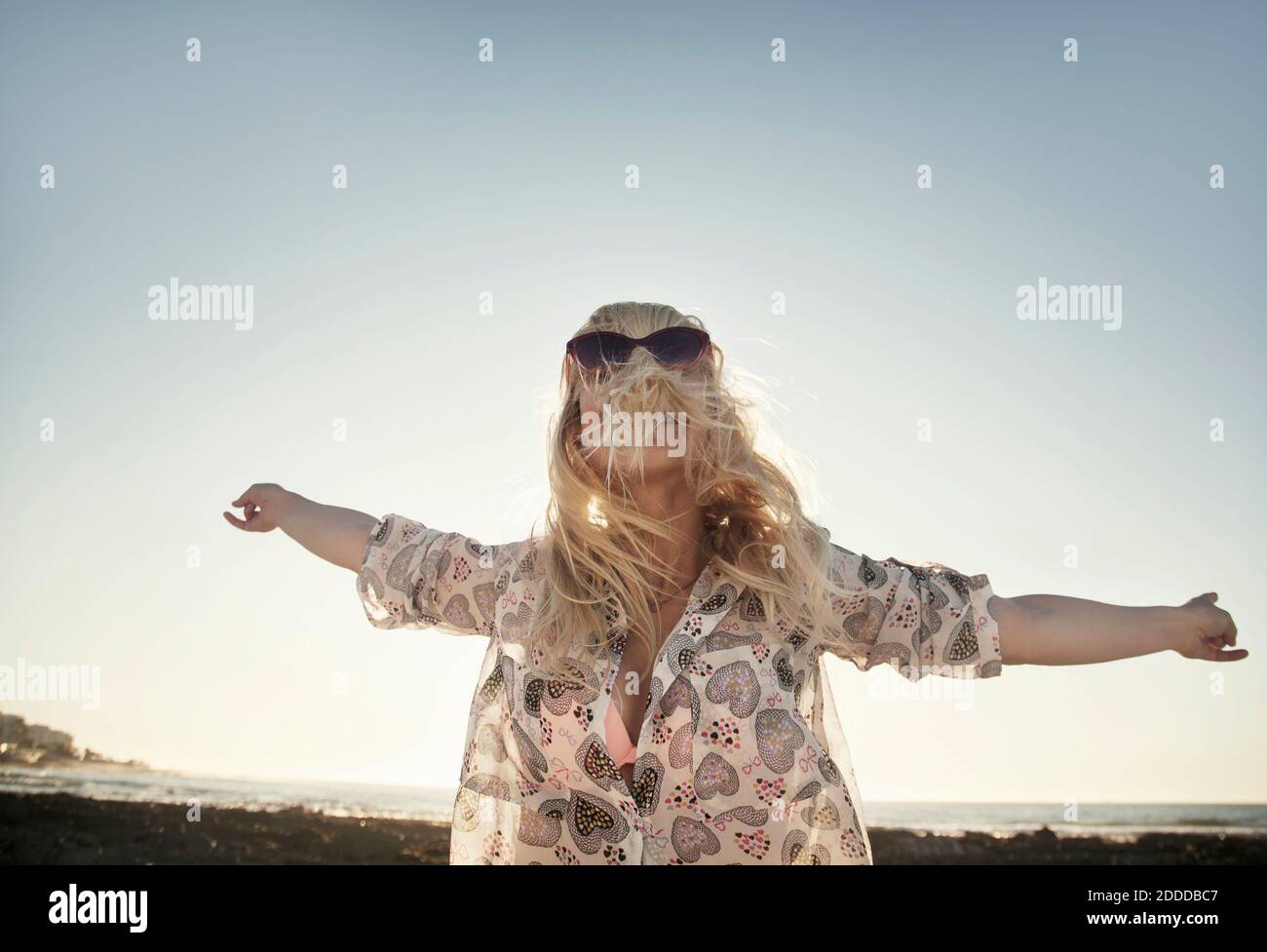 Woman hair covering face arms hi-res stock photography and images - Alamy