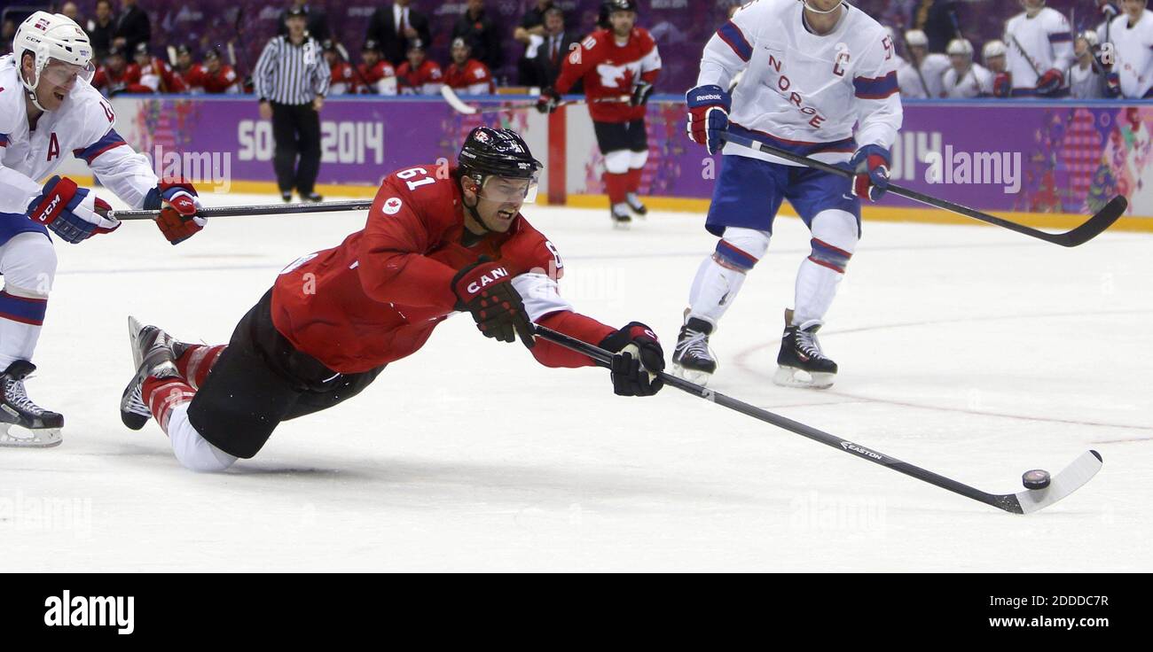 NO FILM, NO VIDEO, NO TV, NO DOCUMENTARY - Canada's Rick Nash (61) takes a  shot against Norway in the third period of a men's hockey game at the  Bolshoy Ice Dome