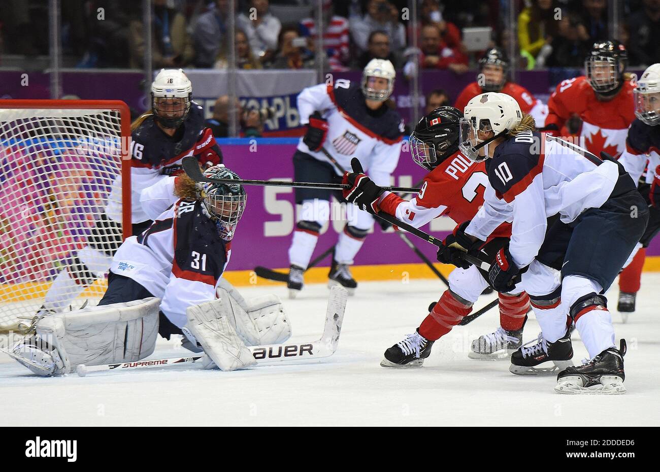 NO FILM, NO VIDEO, NO TV, NO DOCUMENTARY - Canada forward Marie-Philip Poulin (29) scores a goal against USA goalie Jessie Vetter (31) during the third period of the women's Gold Medal hockey game to tie and send the game into overtime at the Winter Olympics in Sochi, Russia, Thursday, February 20, 2014. Canada defeated USA 3-2 in overtime to win the Goal Medal. Photo by Harry E. Walker/MCT/ABACAPRESS.COM Stock Photo