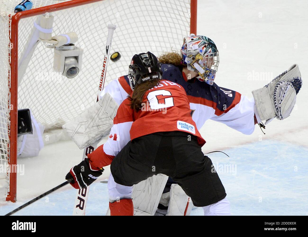 NO FILM, NO VIDEO, NO TV, NO DOCUMENTARY - A shot by Canada forward Brianne Jenner, not pictured, beats USA goalie Jessie Vetter (31) for a goal in the third period of the women's hockey gold medal game at the Bolshoy Ice Dome during the Winter Olympics in Sochi, Russia, Thursday, February 20, 2014. Canada defeated the USA in overtime, 3-2. Photo by Chuck Myers/MCT/ABACAPRESS.COM Stock Photo