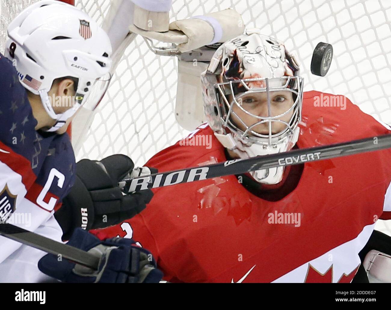 NO FILM, NO VIDEO, NO TV, NO DOCUMENTARY - Team USA captain Zach Parise (9) and team Canada goalie Carey Price (31) in the first period in the men's hockey semifinal at Bolshoy Ice Dome during the Winter Olympics in Sochi, Russia, Friday, February 21, 2014. Canada beat USA 1-0. Photo by Carlos Gonzalez/Minneapolis Star Tribune/MCT/ABACAPRESS.COM Stock Photo