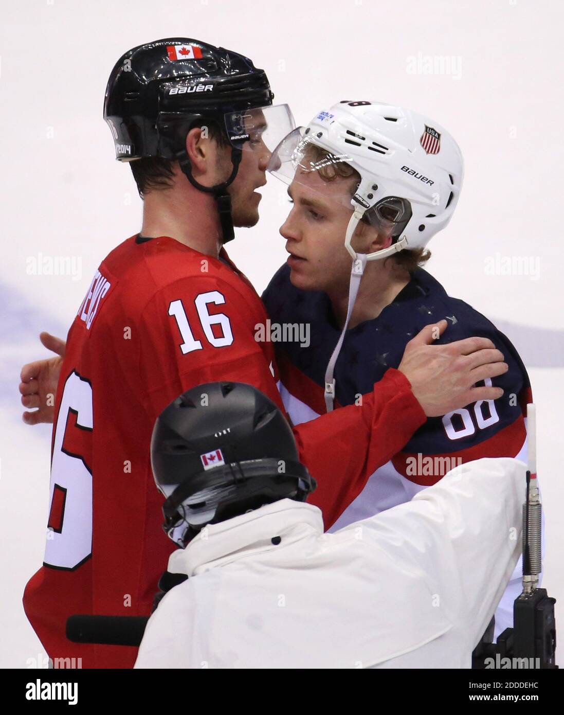NO FILM, NO VIDEO, NO TV, NO DOCUMENTARY - Canada forward Jonathan Toews (16) hugs USA forward Patrick Kane (88) after a men's hockey semifinal at Bolshoy Ice Dome during the Winter Olympics in Sochi, Russia, Friday, February 21, 2014. Canada defeated the USA 1-0 to advance to the gold medal game. Photo by Brian Cassella/Chicago Tribune/MCT/ABACAPRESS.COM Stock Photo