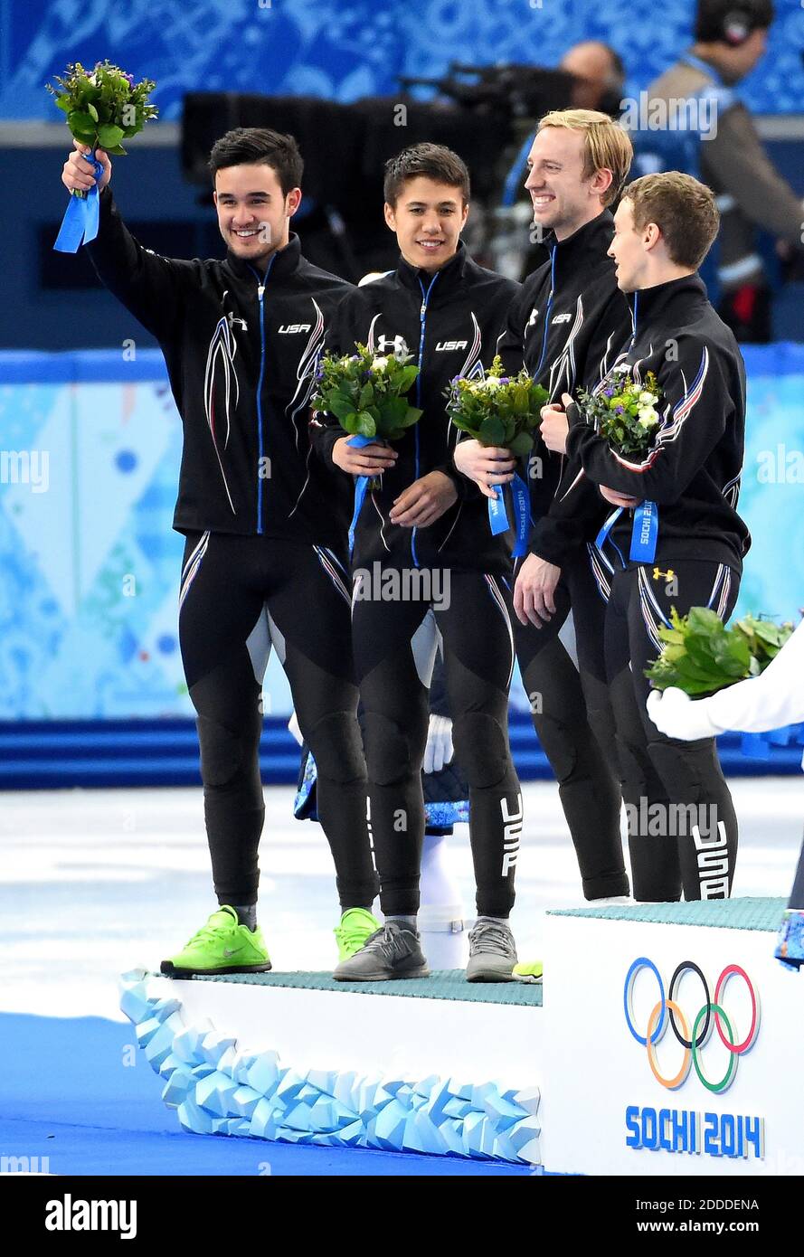 NO FILM, NO VIDEO, NO TV, NO DOCUMENTARY - USA Silver medalist (l-r) Eduardo Alvarez, J.R. Celski, Chris Creveling and Jordan Malone celebrate on the podium their 2nd place finish in the men's 5000 meter relay speed skating race at the Iceberg Skating Palace during the Winter Olympics in Sochi, Russia, Friday, February 21, 2014. Photo by Harry E. Walker/MCT/ABACAPRESS.COM Stock Photo