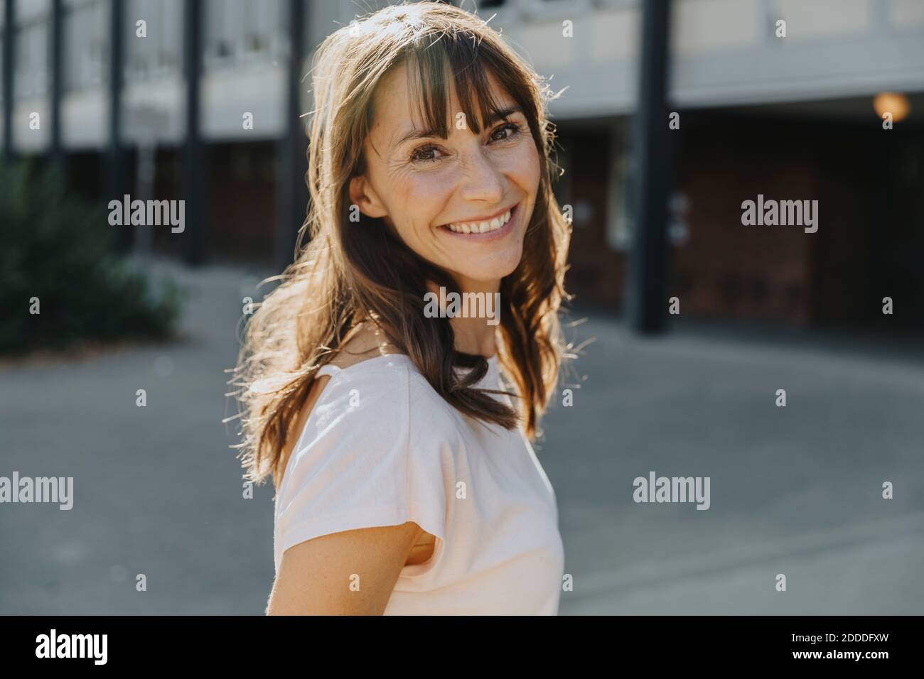 Mature woman standing street hi-res stock photography and images - Alamy