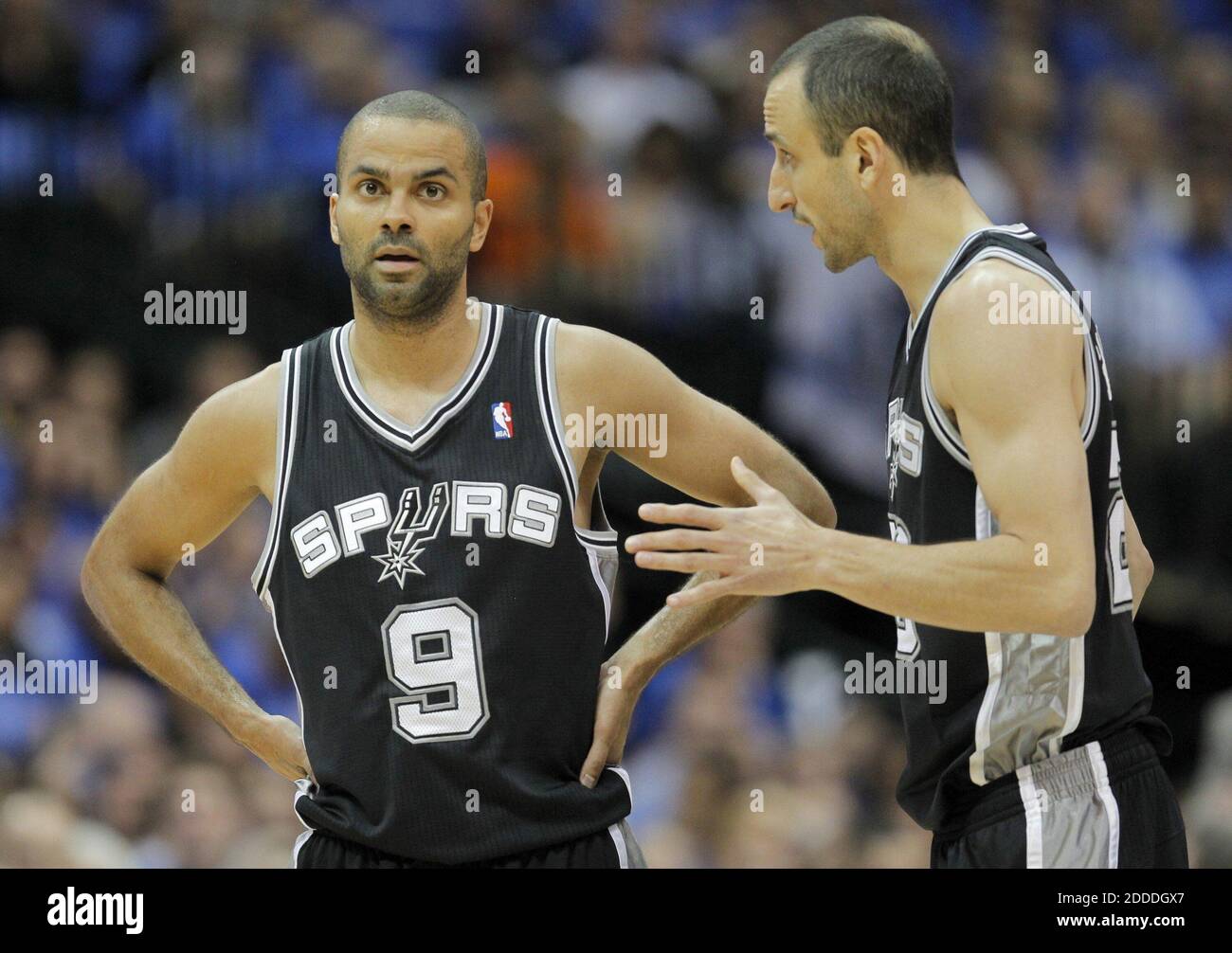 NO FILM, NO VIDEO, NO TV, NO DOCUMENTARY - San Antonio Spurs Tony Parker (9) and Manu Ginobili (20) talk during the first half of Game 4 against the Dallas Mavericks, in the NBA Western Conference quarterfinals at the American Airlines Center in Dallas, TX, USA on April 28, 2014. Photo by Ron Jenkins/Fort Worth Star-Telegram/MCT/ABACAPRESS.COM Stock Photo