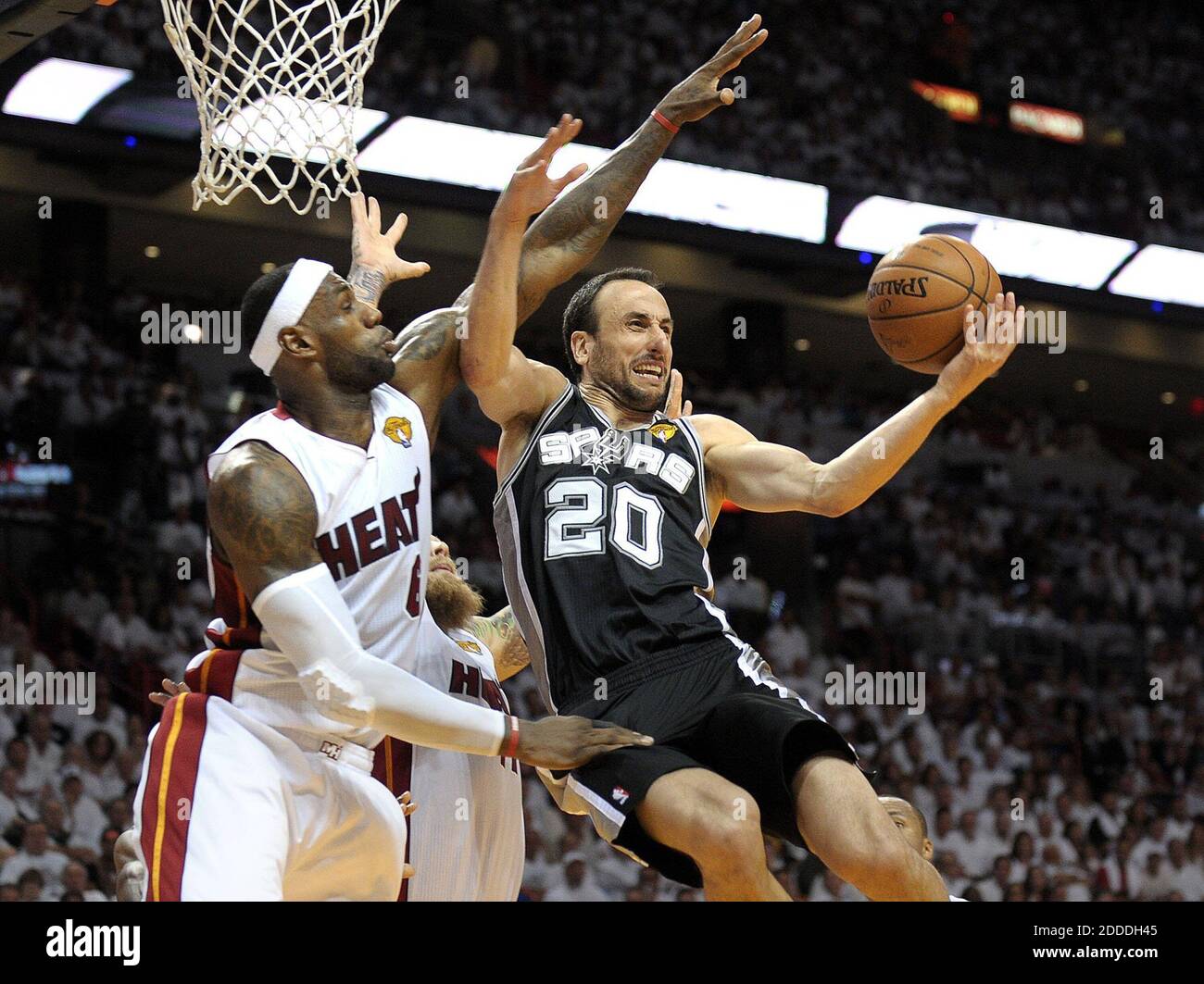 NO FILM, NO VIDEO, NO TV, NO DOCUMENTARY - Miami Heat forward LeBron James defends San Antonio Spurs guard Manu Ginobili during the first half in Game 3 of the NBA Finals at AmericanAirlines Arena in Miami, FL, USA on June 10, 2014. Photo by Michael Laughlin/Sun Sentinel/MCT/ABACAPRESS.COM Stock Photo