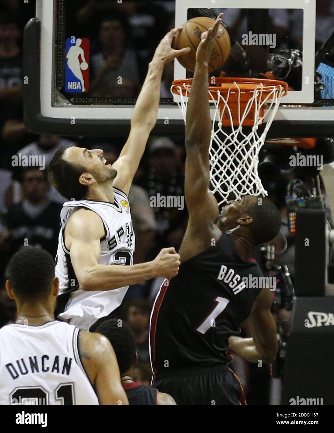 NO FILM, NO VIDEO, NO TV, NO DOCUMENTARY - Miami Heat's Chris Bosh fails to stop San Antonio Spurs' Manu Ginobili as he scores in the second quarter in Game 5 of the NBA Finals at the AT&T Center in San Antonio, TX, USA, on Sunday, June 15, 2014. Photo by Charles Trainor Jr./Miami Herald/MCT/ABACAPRESS.COM Stock Photo