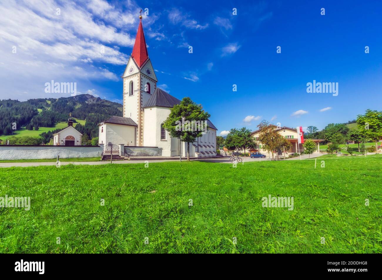 Austria, Tyrol, Schattwald, Historical Pfarrkirche Schattwald church in summer Stock Photo