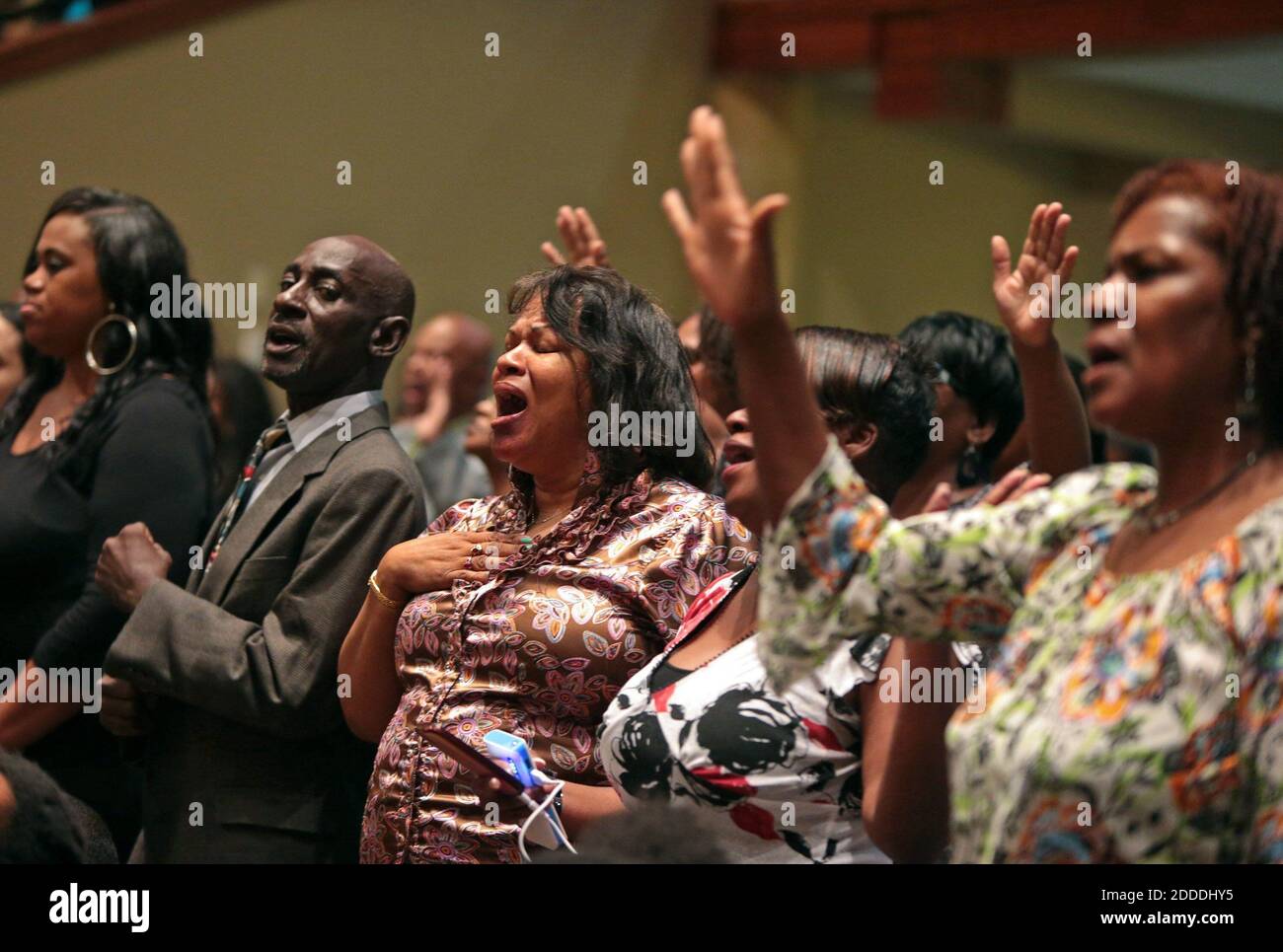 NO FILM, NO VIDEO, NO TV, NO DOCUMENTARY - People attending the funeral services for Michael Brown sing at Friendly Temple Missionary Baptist Church in St. Louis, MO, USA, on Monday, August 25, 2014. Photo by Robert Cohen/St. Louis Post-Dispatch/MCT/ABACAPRESS.COM Stock Photo