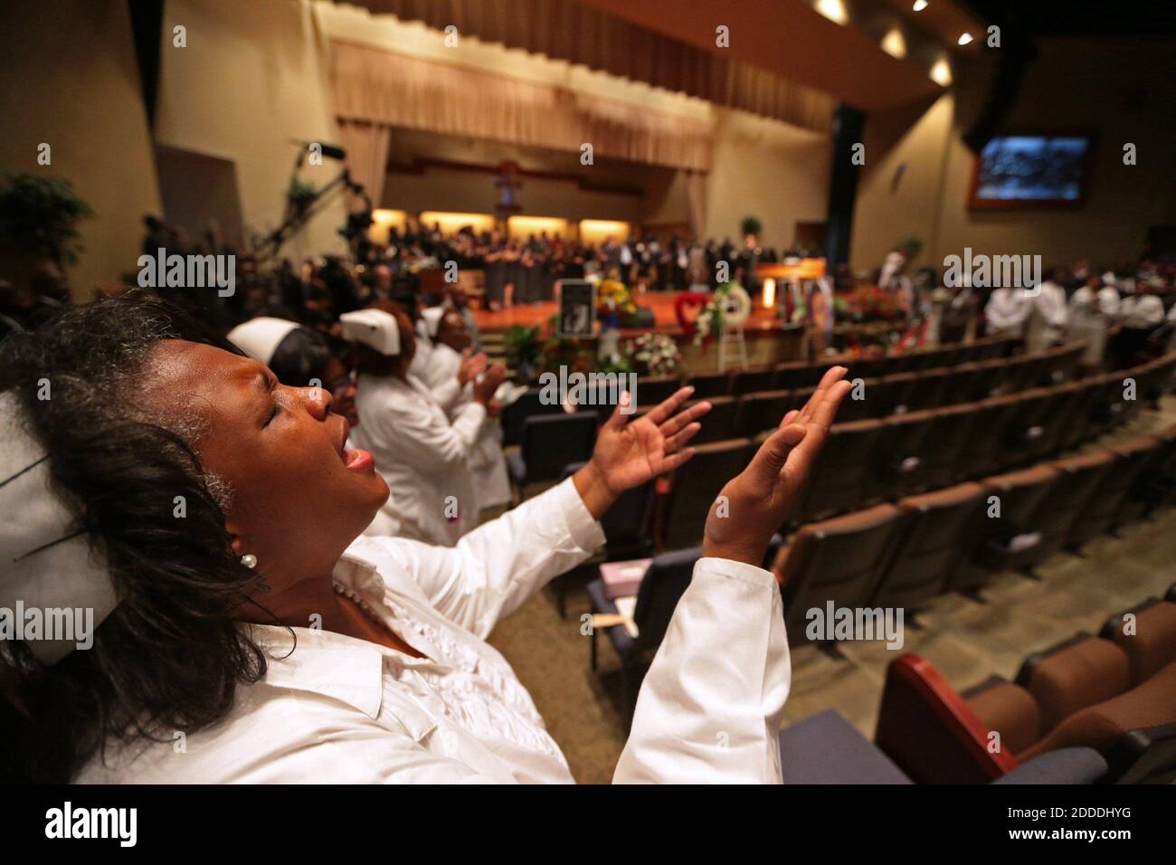 NO FILM, NO VIDEO, NO TV, NO DOCUMENTARY - A woman lifts up her hands during the funeral services for Michael Brown are held on Monday, August 25, 2014, at Friendly Temple Missionary Baptist Church in St. Louis, MO, USA. Michael Brown, 18, was shot and killed by a Ferguson police officer on August 9, 2014. Photo by Robert Cohen/St. Louis Post-Dispatch/MCT/ABACAPRESS.COM Stock Photo