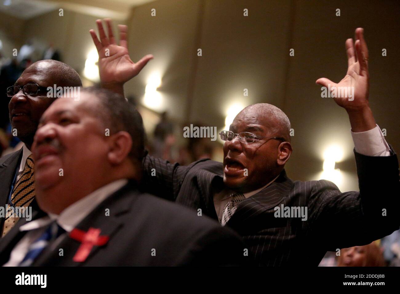NO FILM, NO VIDEO, NO TV, NO DOCUMENTARY - A man reacts to a sermon during the funeral services for Michael Brown on Monday, Aug. 25, 2014, at Friendly Temple Missionary Baptist Church in St. Louis. Michael Brown, 18, was shot and killed by a Ferguson police officer on Aug. 9, 2014. Photo by Robert Cohen/St. Louis Post-Dispatch/MCT/ABACAPRESS.COM Stock Photo