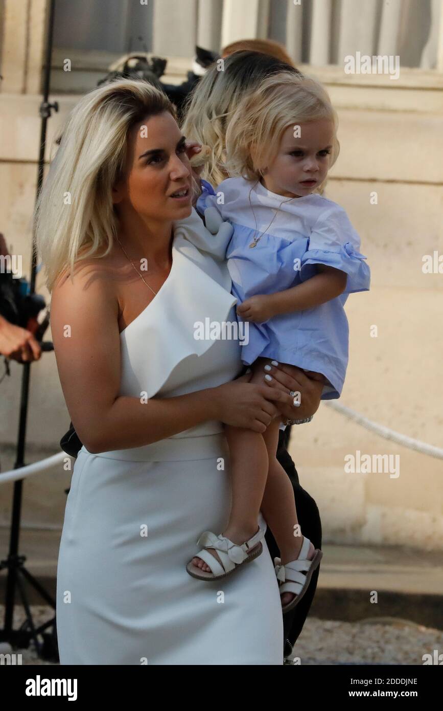 Erika Choperena and her daughter Mia Griezmann companion of Antoine  Griezmann seen arriving when France's President Emmanuel Macron and his  wife Brigitte received he French team, winner of the FIFA World Cup