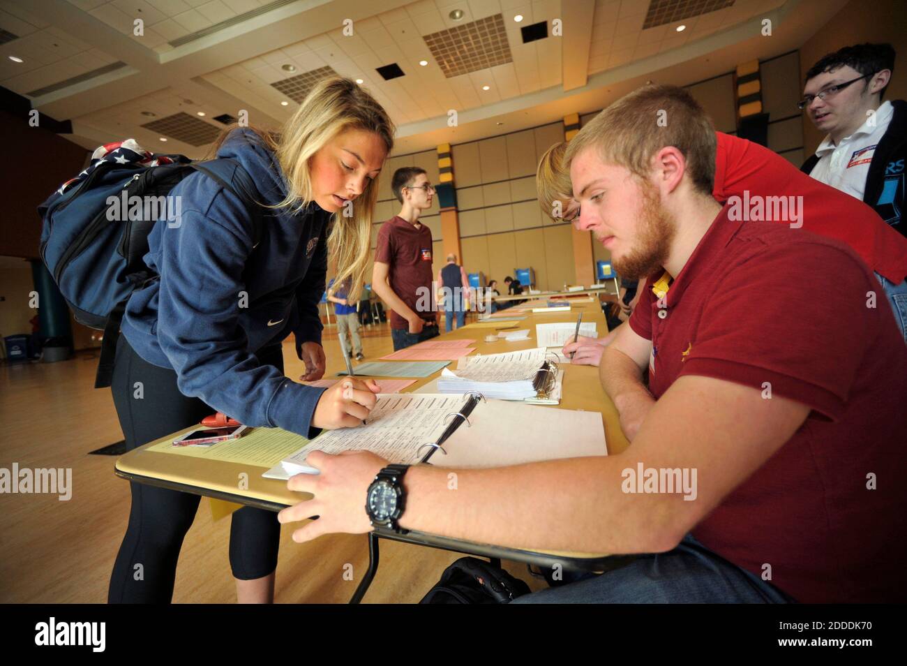 NO FILM, NO VIDEO, NO TV, NO DOCUMENTARY - Election official Britt Munnell checks in Penn State student Emilee Ehret before she votes in the HUB building in University Park, Pa., on Tuesday, November 4, 2014. Photo by Nabil K. Mark/Centre Daily Times/MCT/ABACAPRESS.COM Stock Photo