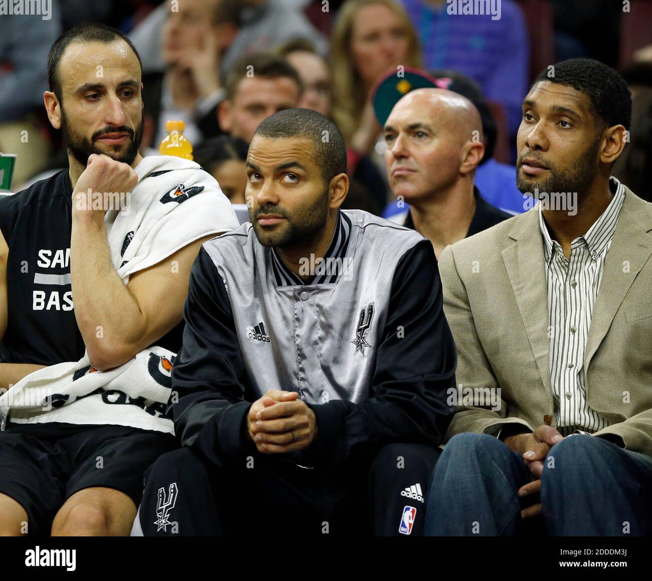 NO FILM, NO VIDEO, NO TV, NO DOCUMENTARY - San Antonio Spurs' Manu Ginobili, Tony Parker and Tim Duncan sit on the Spurs bench against the Philadelphia 76ers on Monday, Dec. 1, 2014, at Wells Fargo Center in Philadelphia. Parker and Duncan did not play during the first half. (Yong Kim/Philadelphia Inquirer/TNS) Stock Photo