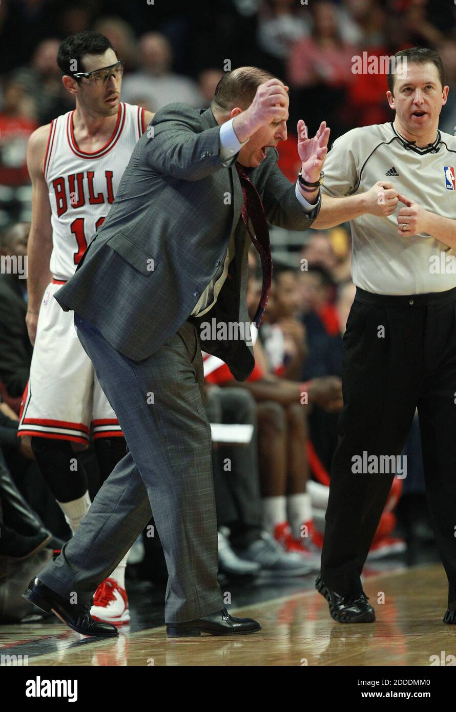 NO FILM, NO VIDEO, NO TV, NO DOCUMENTARY - Chicago Bulls head coach Tom Thibodeau gestures to the referee how Kirk Hinrich, left, didn't foul the Brooklyn Nets' Deron Williams, not pictured, in the fourth quarter at the United Center in Chicago, IL, USA on December 10, 2014. Photo by John J. Kim/Chicago Tribune/TNS/ABACAPRESS.COM Stock Photo