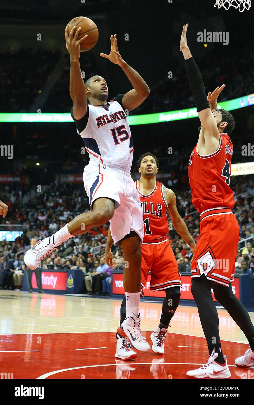 NO FILM, NO VIDEO, NO TV, NO DOCUMENTARY - Atlanta Hawks' Al Horford grabs a rebound and goes to the basket for two points over Chicago Bulls defenders at Philips Arena in Atlanta, GA, USA on December 15, 2014. Photo by Curtis Compton/Atlanta Journal-Constitution/TNS/ABACAPRESS.COM Stock Photo