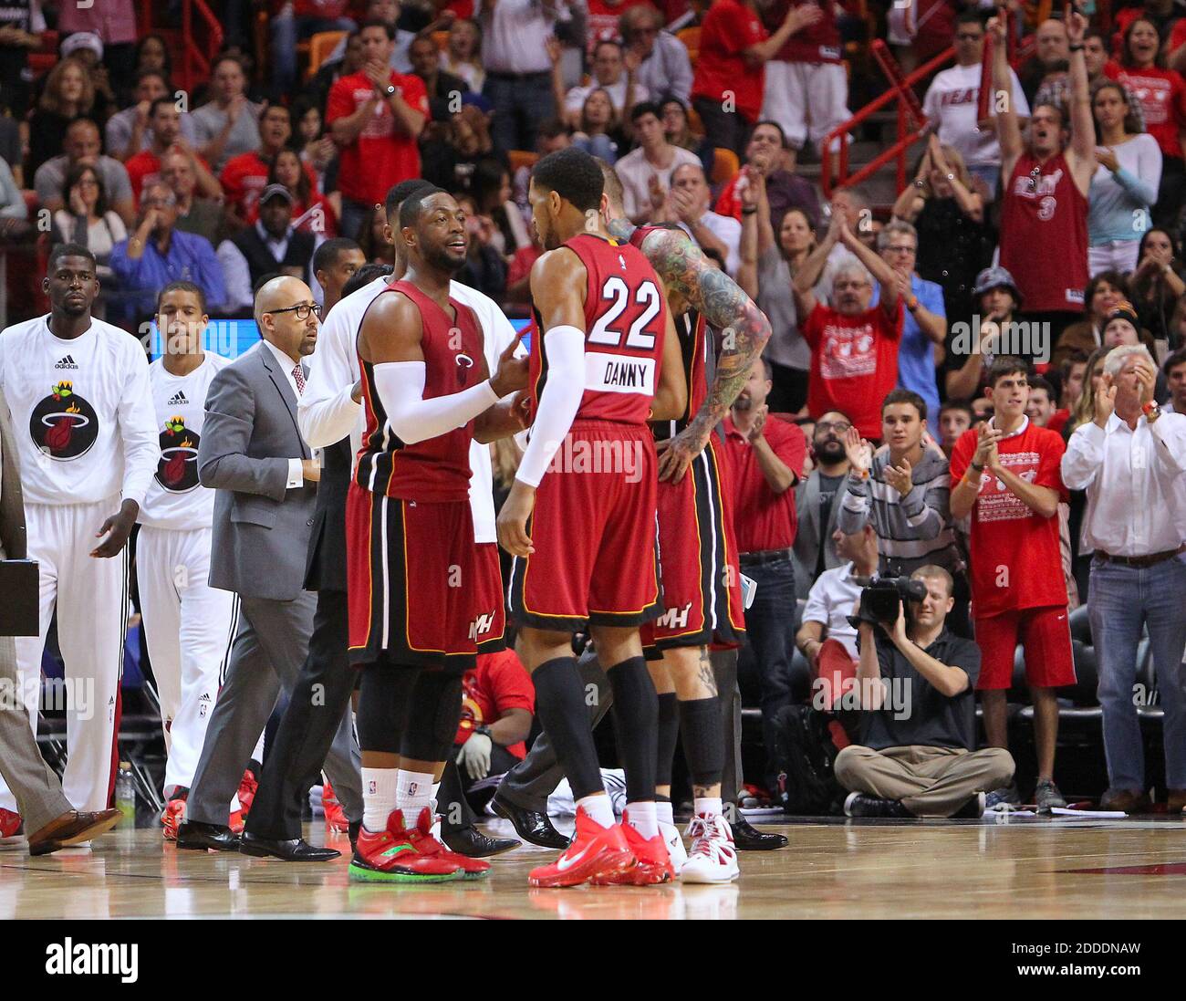 NO FILM, NO VIDEO, NO TV, NO DOCUMENTARY - Miami Heat guard Dwyane Wade  talks to teammate Miami Heat forward Danny Granger in the fourth quarter of  an NBA basketball game against