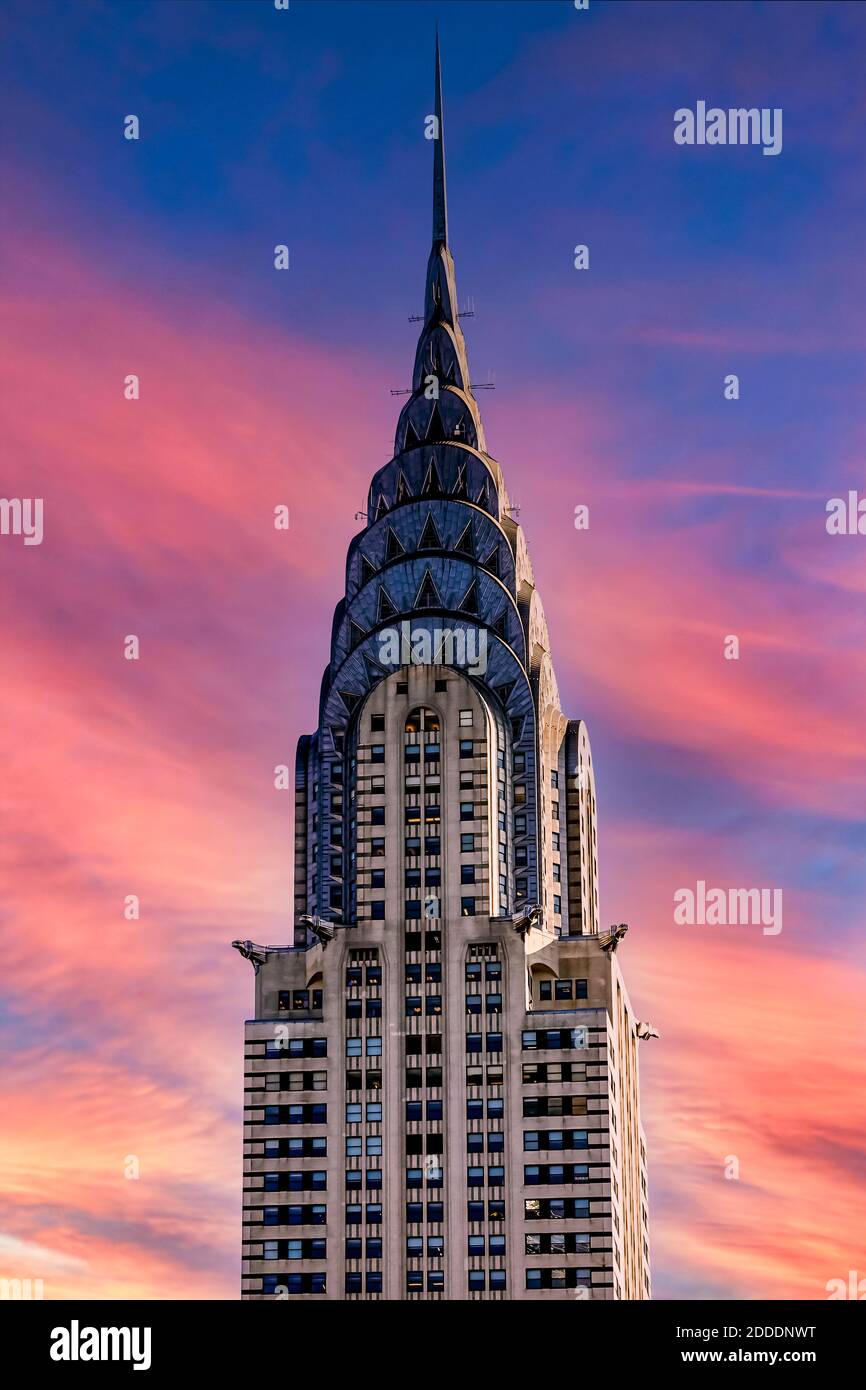 Chrysler Building against orange sky during sunset, New York, USA Stock Photo