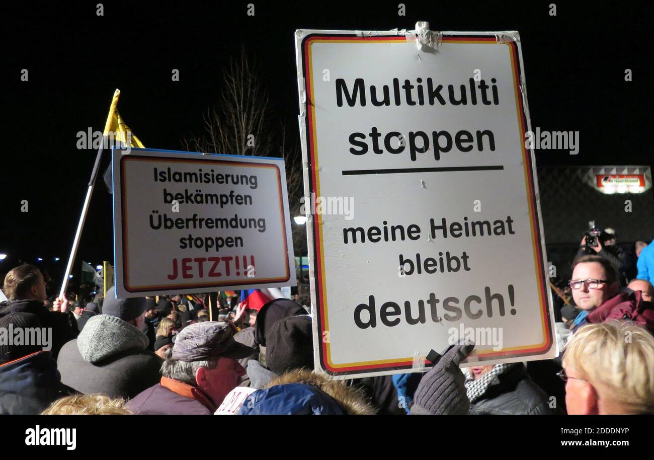 NO FILM, NO VIDEO, NO TV, NO DOCUMENTARY - Signs at a rally on Monday, January 12, 2015, in Dresden, Germany. The one on the left reads Fight Islamization, stop the flood of foreigners now. The right one reads Stop multiculturalism. My homeland will stay German. Photo by Claudia Himmelreich/McClatchy DC/TNS/ABACAPRESS.COM Stock Photo