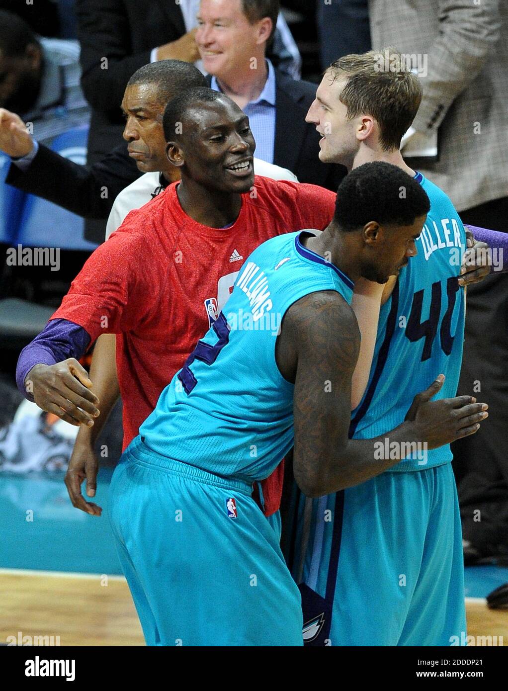 Miami Heat center Cody Zeller (44) and Charlotte Hornets forward Gordon  Hayward (20) embrace during the