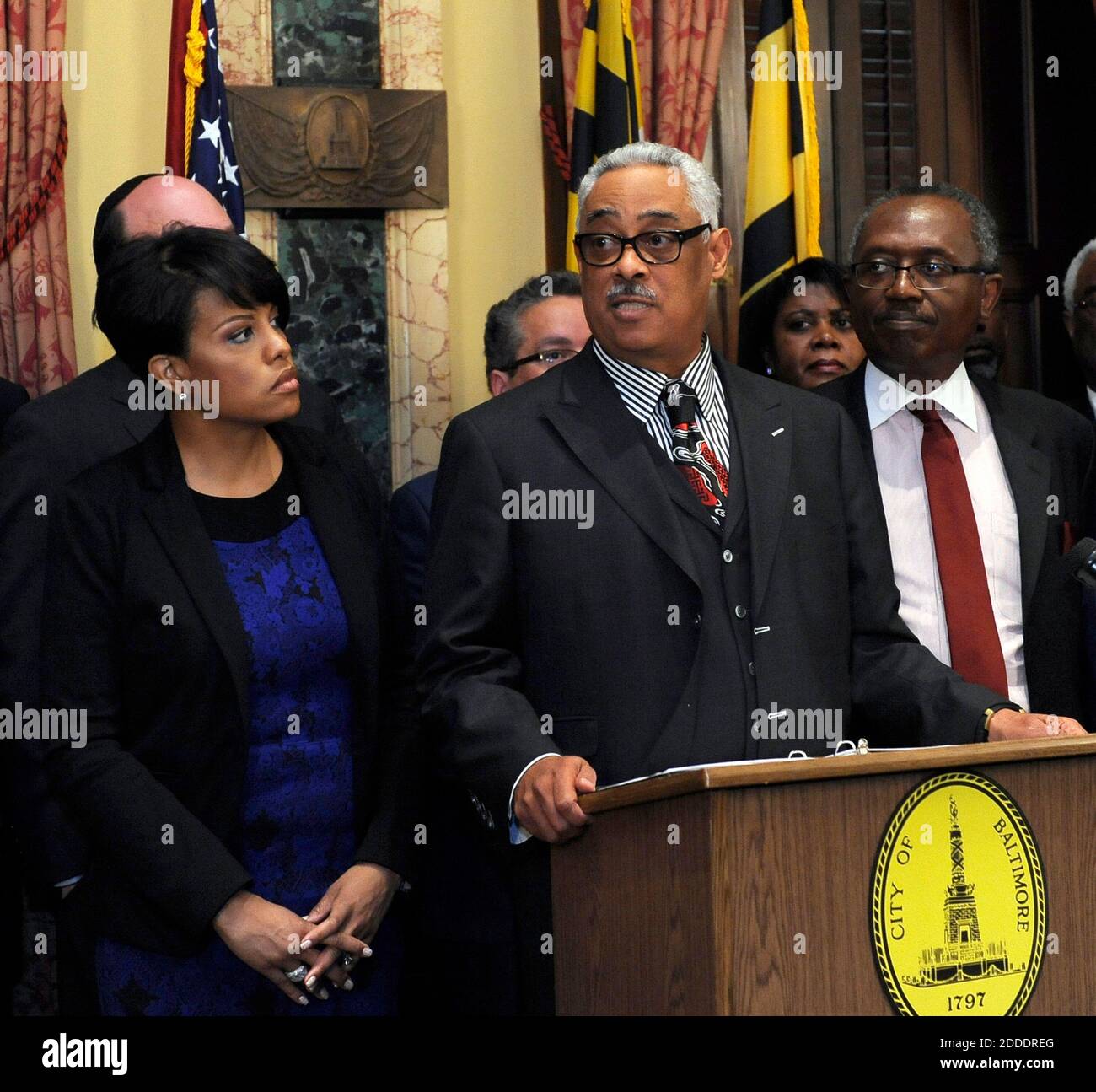 NO FILM, NO VIDEO, NO TV, NO DOCUMENTARY - Rev. Dr. Frank Reid III, pastor of Bethel AME, speaks from the podium next to Mayor Stephanie Rawlings-Blake as she holds a news conference after meeting with several faith-based leaders on Friday, April 24, 2015, to discuss the community response following the death of Freddie Gray. Photo by Barbara Haddock Taylor/Baltimore Sun/TNS/ABACAPRESS.COM Stock Photo