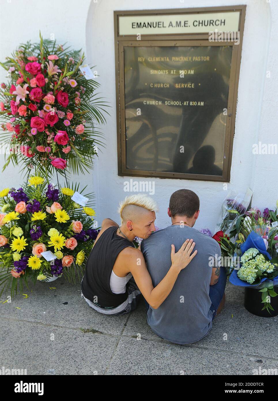 NO FILM, NO VIDEO, NO TV, NO DOCUMENTARY - Ashley Edge, left, and Brad Hutchinson, from Charleston, grieve at the memorial in front of the Emanuel AME Church where 9 people were killed including the pastor on Thursday, June 18, 2015, in Charleston, SC, USA. Photo by Curtis Compton/Atlanta Journal-Constitution/TNS/ABACAPRESS.COM Stock Photo