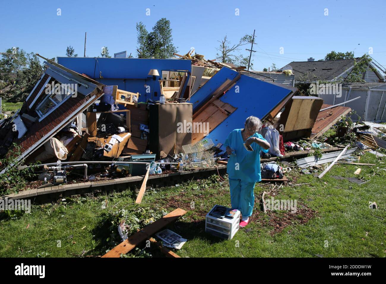 NO FILM, NO VIDEO, NO TV, NO DOCUMENTARY - Pat Reece deals with her destroyed house on Mazon Street in Coal City, IL, USA, on Tuesday, June 23, 2015, the morning after a severe storm tore through the area. Photo by Antonio Perez/Chicago Tribune/TNS/ABACAPRESS.COM Stock Photo