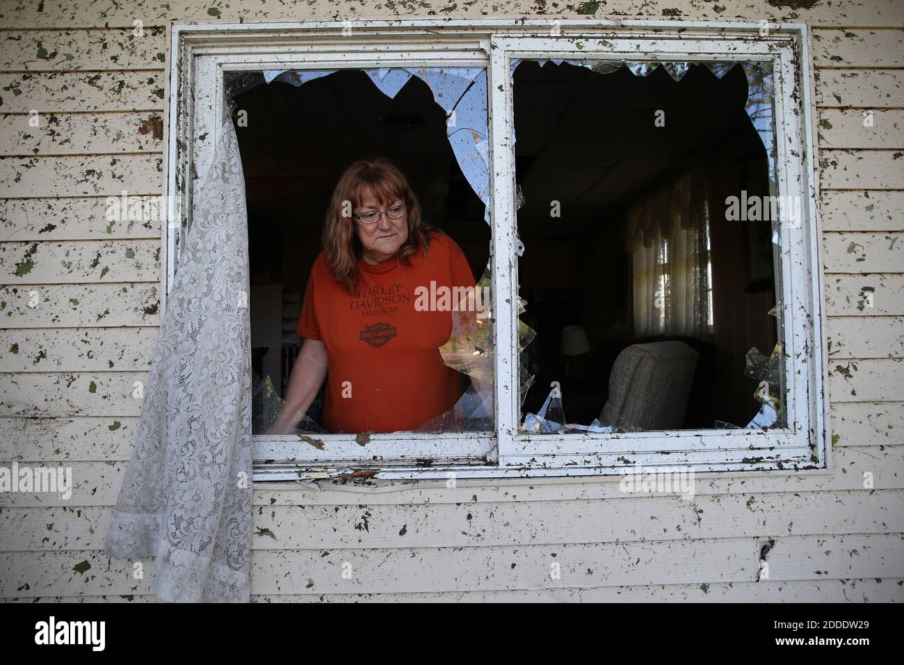 NO FILM, NO VIDEO, NO TV, NO DOCUMENTARY - Linda Maland looks at damage to her neighborhood along Mazon Street in Coal City, IL, USA, on Tuesday, June 23, 2015, the morning after a severe storm tore through the area. Photo by Antonio Perez/Chicago Tribune/TNS/ABACAPRESS.COM Stock Photo
